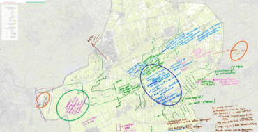 Een geniedskaart met daarop omcirkelde gebieden.